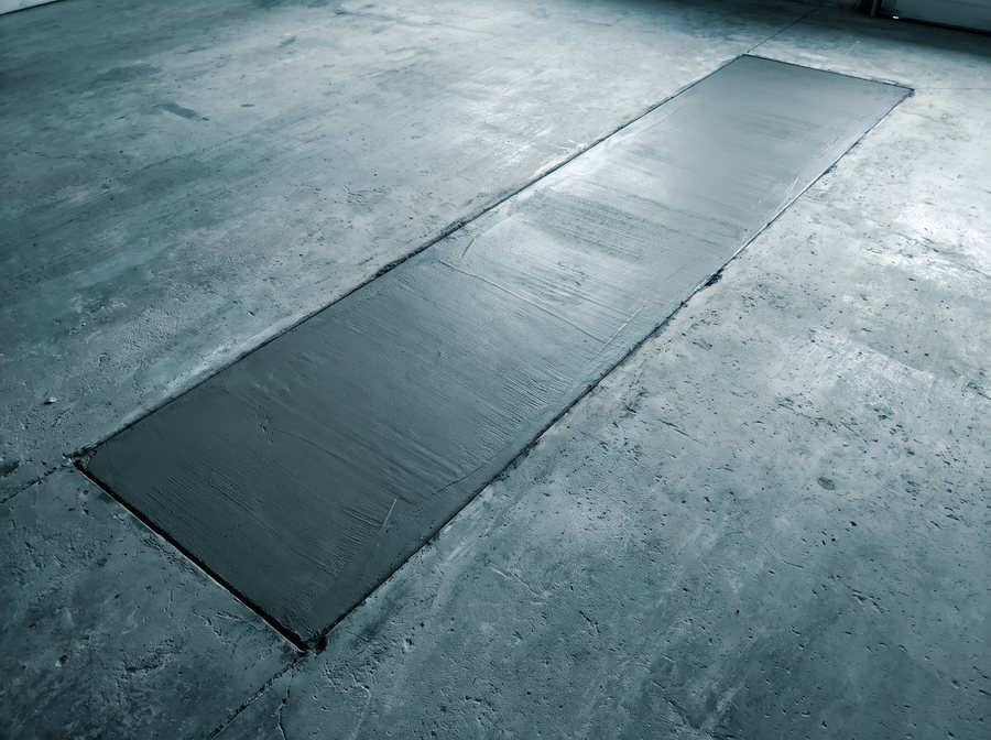 Illustration: a strip of floor poured back where a wall was removed