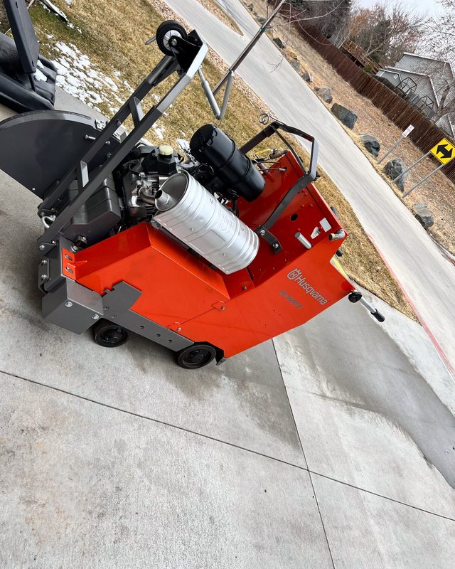 Photo: a walk-behind flat saw on a NoCo job